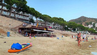 Blondie topless in Spain beach at 5:20