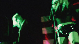 4. The singer in a transparent shirt.