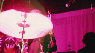 5. The singer in a transparent shirt.
