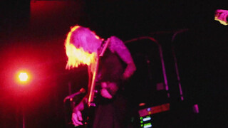 9. The singer in a transparent shirt.