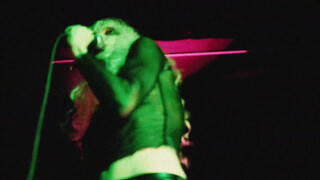 3. The singer in a transparent shirt.