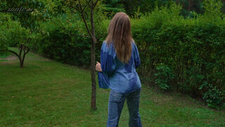9. Girl pees her jeans at 1:00, boob visible in “Coffee and wet jeans in nature … #wetlook #model #jeans”
