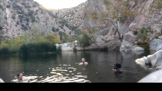 Cute girls at the hot springs drift into frame for a few seconds. [23:43]
