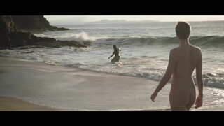 From a movie: nudists watch migrants wash ashore