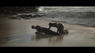 7. From a movie: nudists watch migrants wash ashore