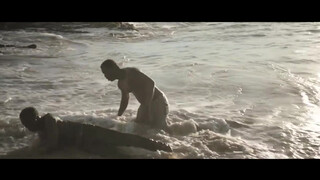 8. From a movie: nudists watch migrants wash ashore