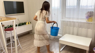 4. Sexy girl mopping the floor in a see-through dress 0:06