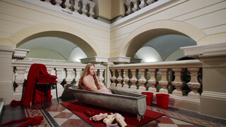 Voluptuous performance artist disrobing… again… (3:02)