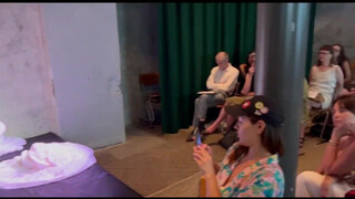 7. Voluptious performance artist disrobing (0:36)