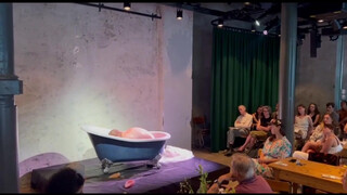 10. Voluptious performance artist disrobing (0:36)