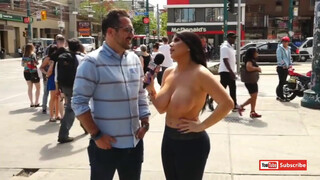 4. Topless pornstar Romi rain in public. I can see some kids in the crowd