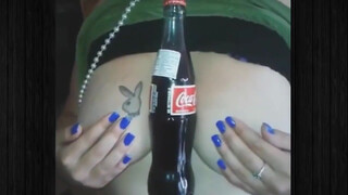 Nude and naked girls holding soda cans with boobs challenge