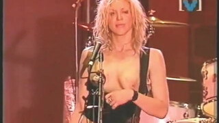 10. Courtney Love Pulls Out Tits @1:07