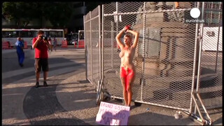 5. Chained naked to a fence, woman protests against sexism in Brazil