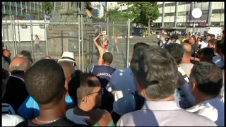7. Chained naked to a fence, woman protests against sexism in Brazil
