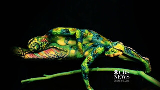 3. Artists with tattoos and body paint (nudity throughout most of the video)