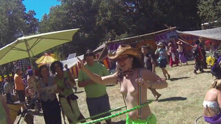 1. Topless Cowgirl Hippy with Lime Green Hula Hoop and Rave Skirt Enjoying the Sunny Day at a Festival