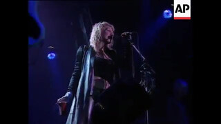 Courtney Love exposes her breast