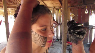 4. Beautiful girl gets full body indigenous tribal ink