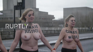 5. Sure looks chilly : UK: Topless climate activists block London bridge with human chain on IWD *EXPLICIT*
