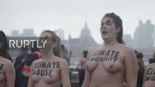1. Sure looks chilly : UK: Topless climate activists block London bridge with human chain on IWD *EXPLICIT*