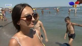 9. Topless beach girls on a romanian tv