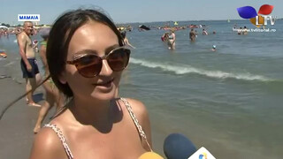10. Topless beach girls on a romanian tv