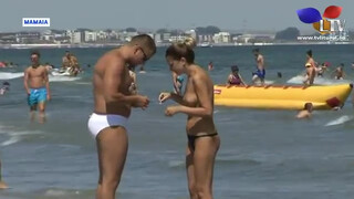 3. Topless beach girls on a romanian tv
