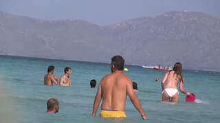 5. Topless Frisbee beach girl