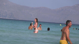 7. Topless Frisbee beach girl