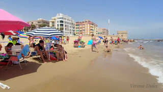 7. Titties on a Spanish beach