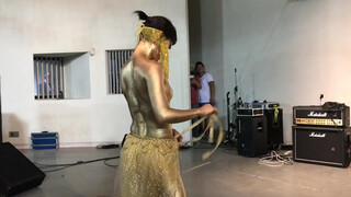 7. Dancer in gold body paint gets topless