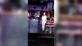 2. Nude magician on stage [1:15 and throughout]