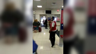 5. Black woman walking naked in airport (nude throughout)