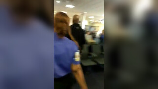 7. Black woman walking naked in airport (nude throughout)
