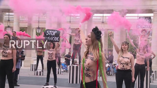 1. Topless FEMEN activists protest violence against women in Paris