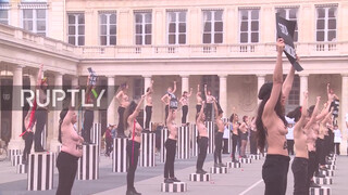 3. Topless FEMEN activists protest violence against women in Paris