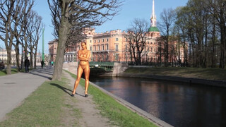 9. Golden girl nude in public