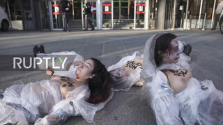 4. Spain: Topless FEMEN activists decry violence against women in Madrid