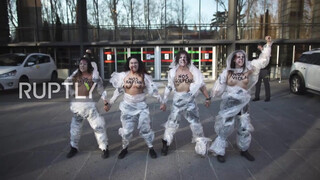 6. Spain: Topless FEMEN activists decry violence against women in Madrid
