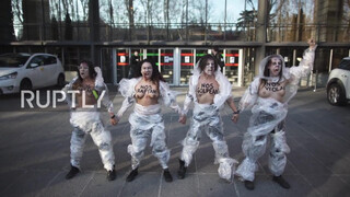 7. Spain: Topless FEMEN activists decry violence against women in Madrid