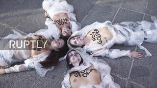 2. Spain: Topless FEMEN activists decry violence against women in Madrid