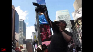 10. Andy Golub body paints model Tynisha Eaton in Times Square