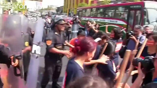 1. Topless protesters clash with police in Peru
