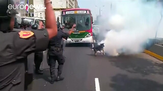 7. Topless protesters clash with police in Peru