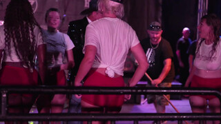 6. One of the wet Tshirt contestents starts licking another one on stage at a wet Tshirt contest in Daytona