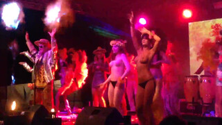 6. Dancing on stage topless