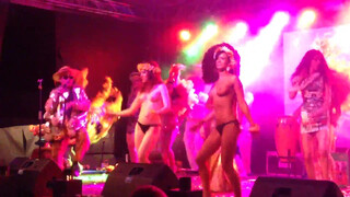 9. Dancing on stage topless