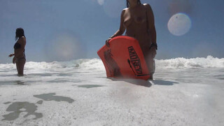 7. Nude girls enjoying the warm surf (1:42 or https://youtu.be/6ynpY-pHxUI?t=102)