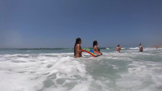 3. Nude girls enjoying the warm surf (1:42 or https://youtu.be/6ynpY-pHxUI?t=102)